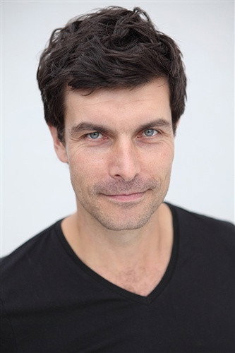 Christophe Paou as Stéphane Lemarchand, le ministre in Bloody Oranges