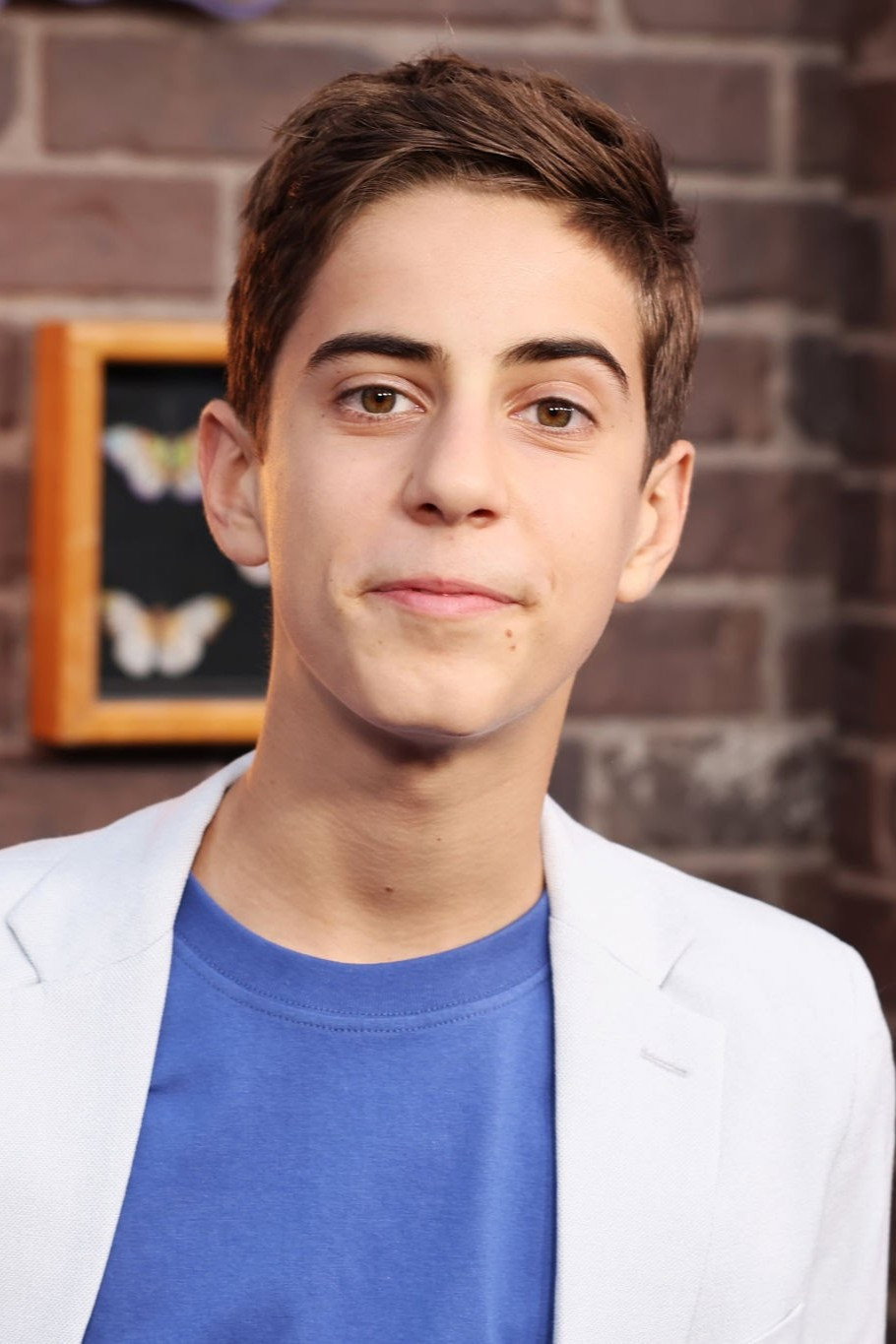 Alkaio Thiele as Roman Russo in Wizards Beyond Waverly Place