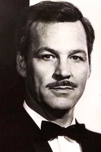 Chris Alcaide as Robert Bishop in The Miami Story