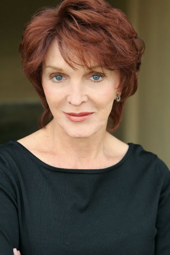 Lynn Milano as Ms. Grier in Heat Wave