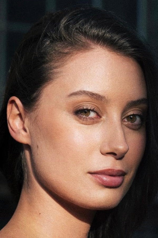 Melisa Ferhatovic as Amina Besic in A Nearly Normal Family