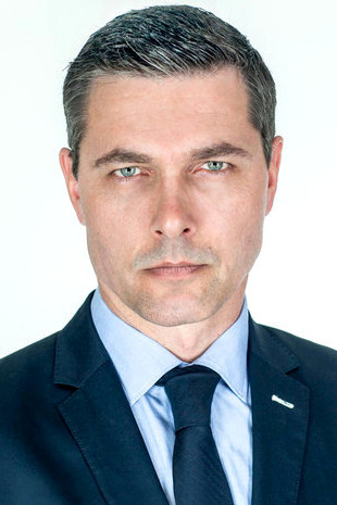 Michael Philip as Host in Welcome to Paradox