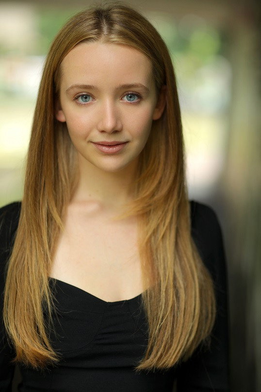 Delphi Evans as Abby Riser in Girl Taken