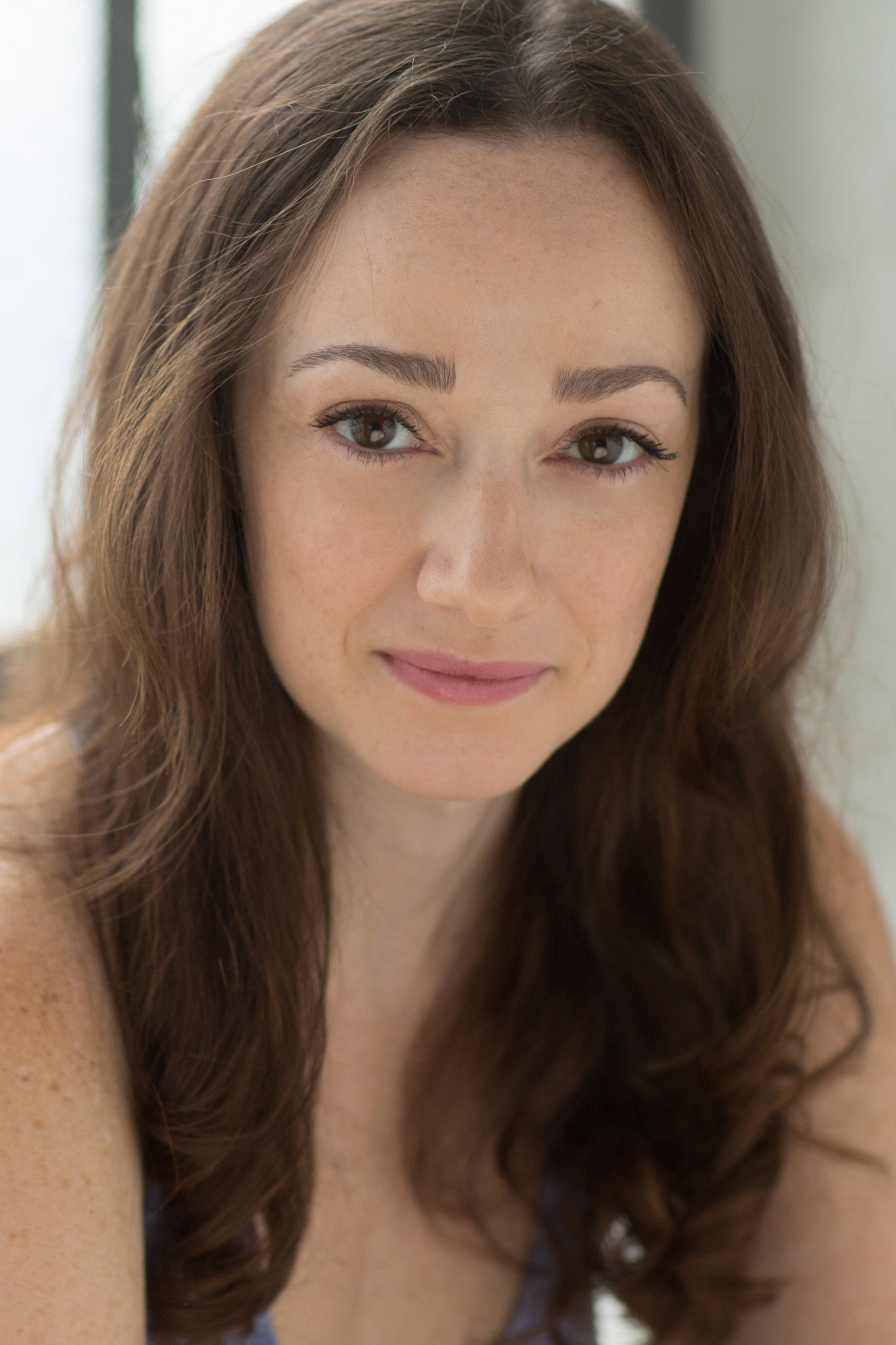 Megan McGinnis as Betty Cratchit in Estella Scrooge