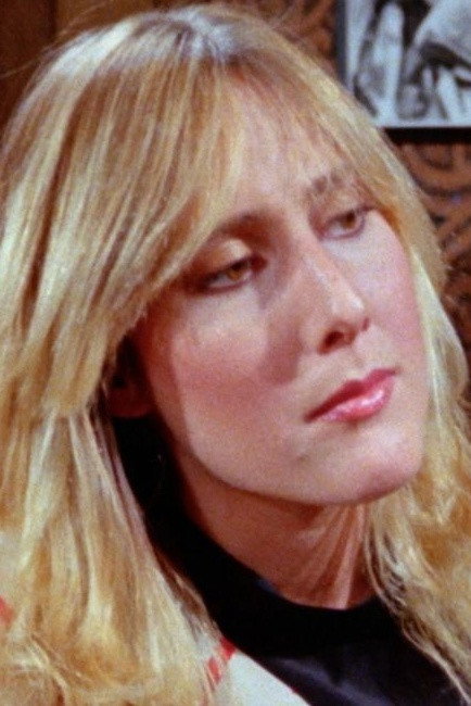 Ashley Brooks as Dominique Allwyn in Tinseltown
