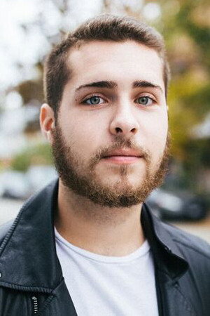 Alex Zaichkowski as John in Lost & Found Music Studios