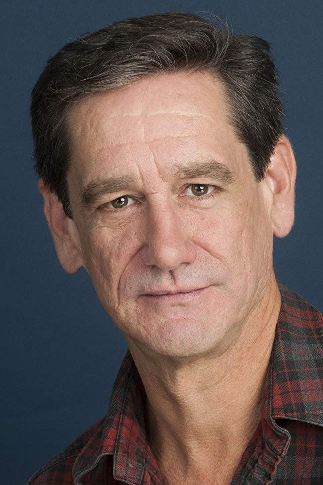 Martin Julien as Les Canivet in A Savage Christmas: The Fall of Hong Kong