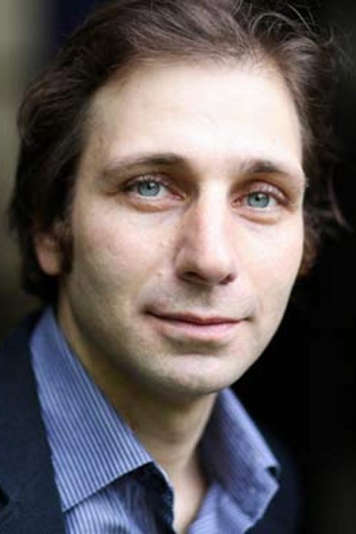 Grégoire Tachnakian as Hector in The Rendez-Vous of Déjà-Vu