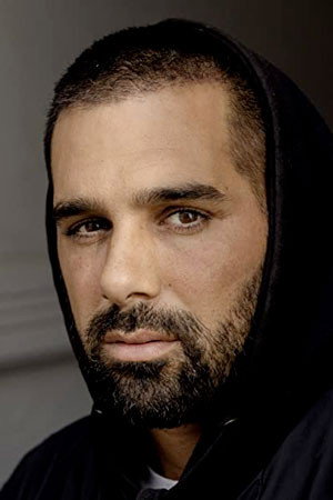 Zaki Youssef as Malik in Sons of Denmark