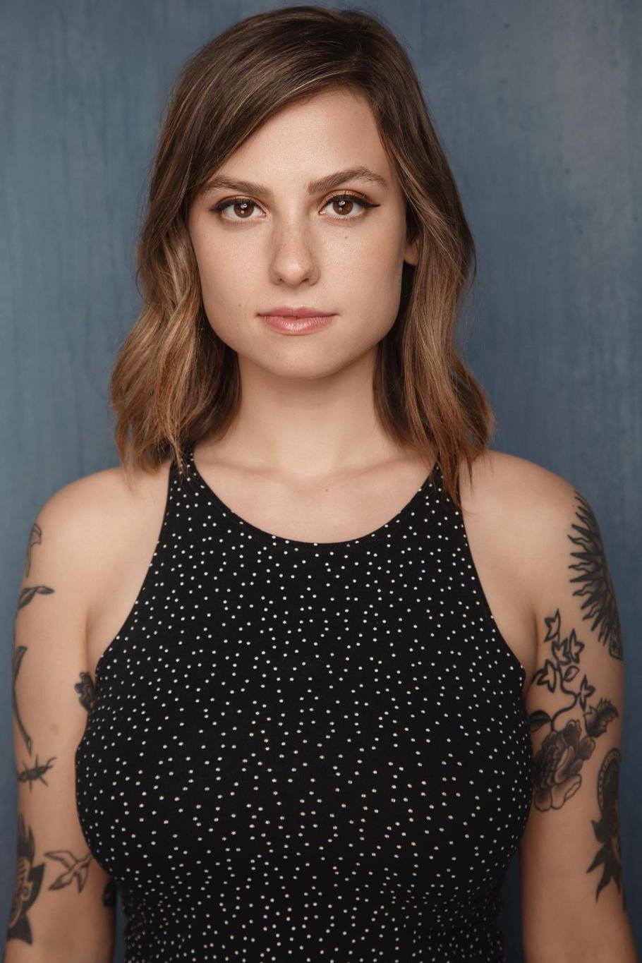 Natalie Cuomo as Coworker 1 in Data Management