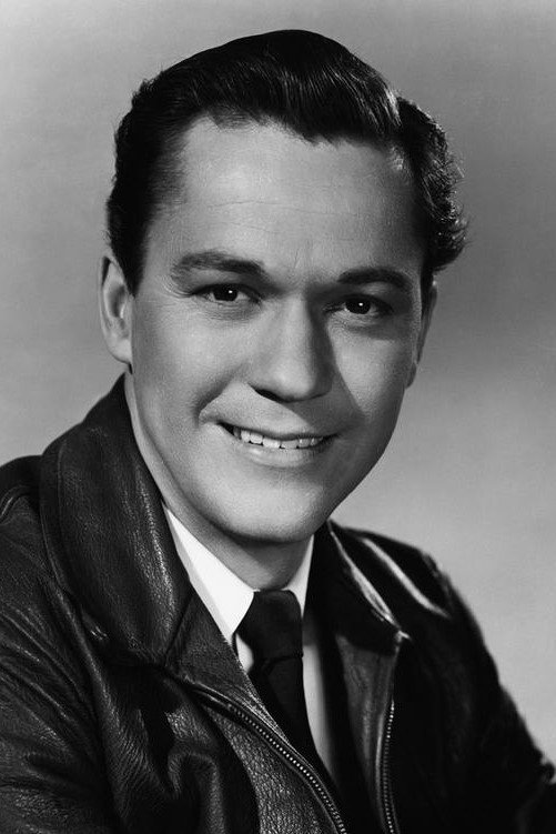 Kirby Grant as Bud Matthews in Bullet Code