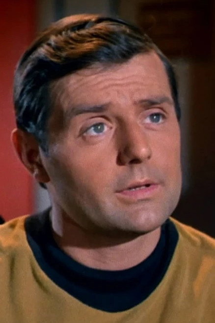 Hagan Beggs as Evans in Spider-Man: The Dragon's Challenge