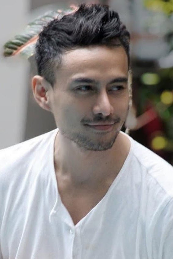 Erlando Saputra as Aji in The Dancing Spirit of Karawang