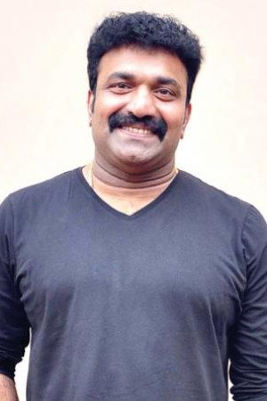 Kottayam Nazeer as George Kutty in Kudumbasree Travels
