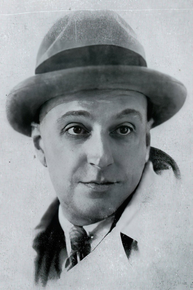 Fernand René as Father Donadieu in Vire-vent