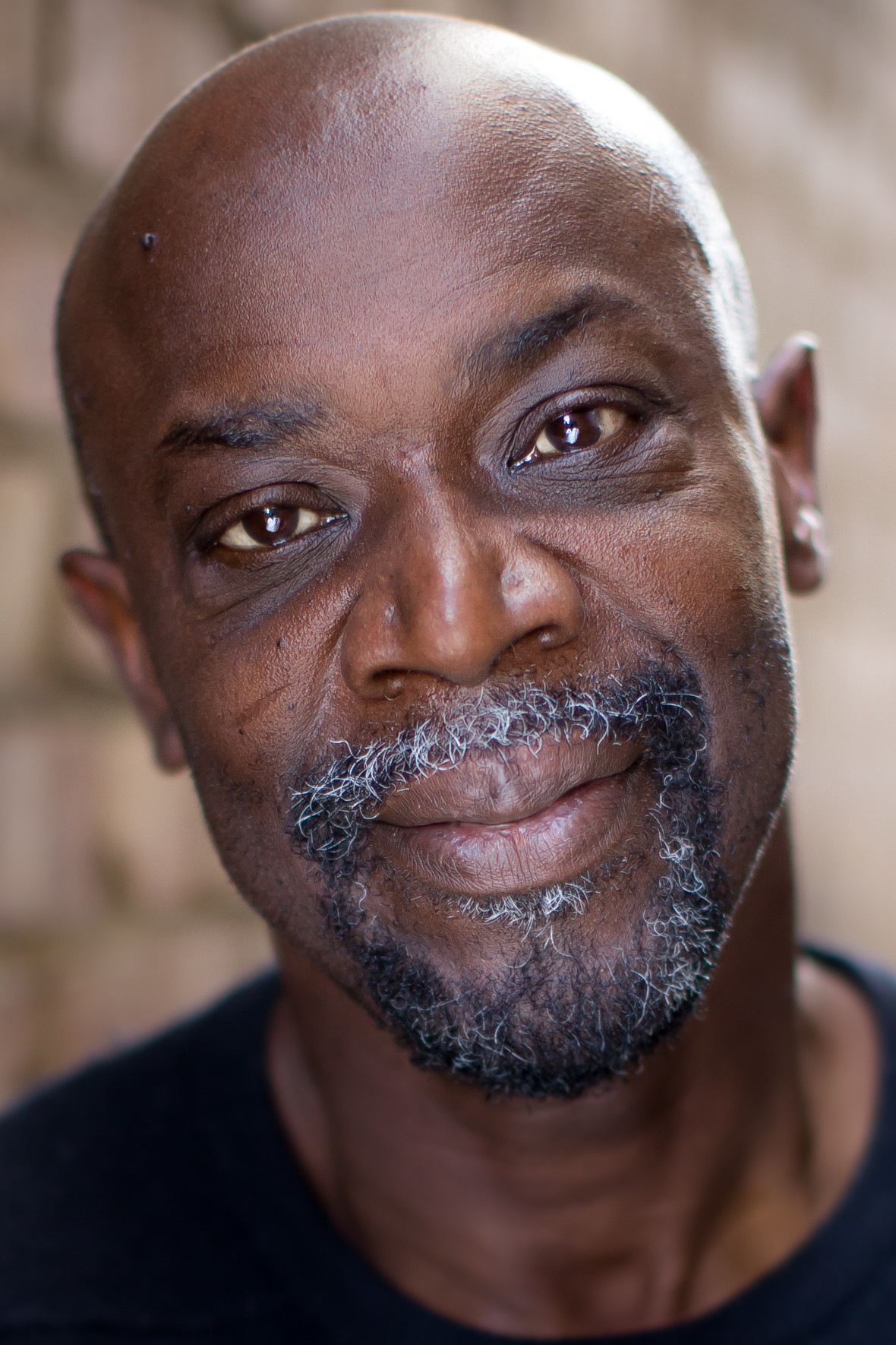 Eddie Osei as The Mechanic in The Last Mechanic