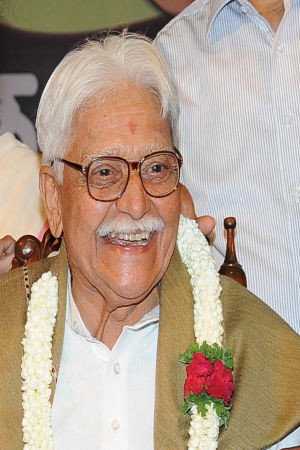 Sadashiva Brahmavar as Shopkeeper in Bettada Hoovu