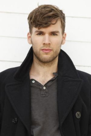 Riley Neldam as Tim in I Ship It