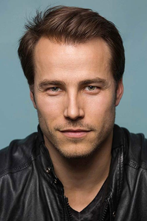 Karl E. Landler as Lucas in Christmas in Paris