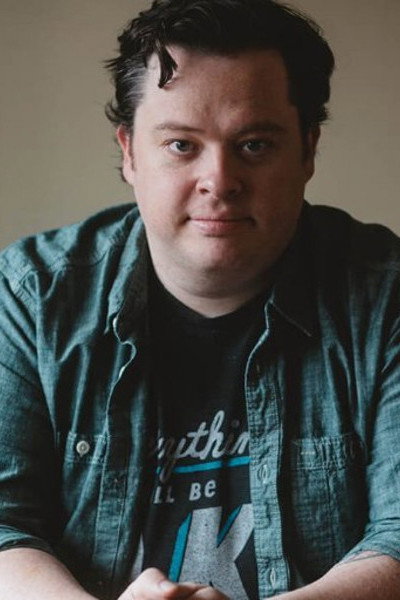 Justin McElroy as Self / Chris Evergreen in The Candlenights 2020 Special