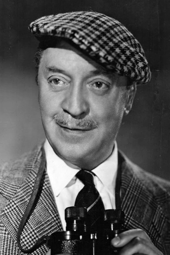 Basil Radford as Prendergast in A Girl in a Million
