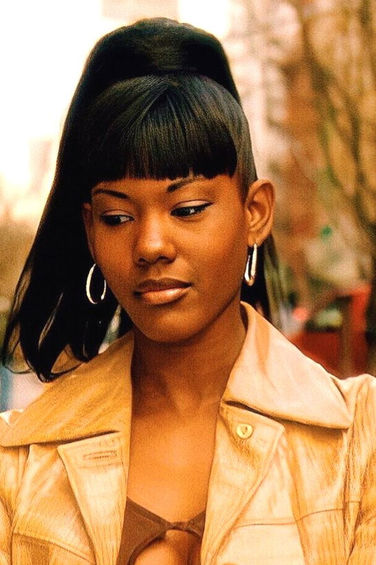 Taral Hicks as Woman with Flowers  (segment "Sax Cantor Riff") in Subway Stories