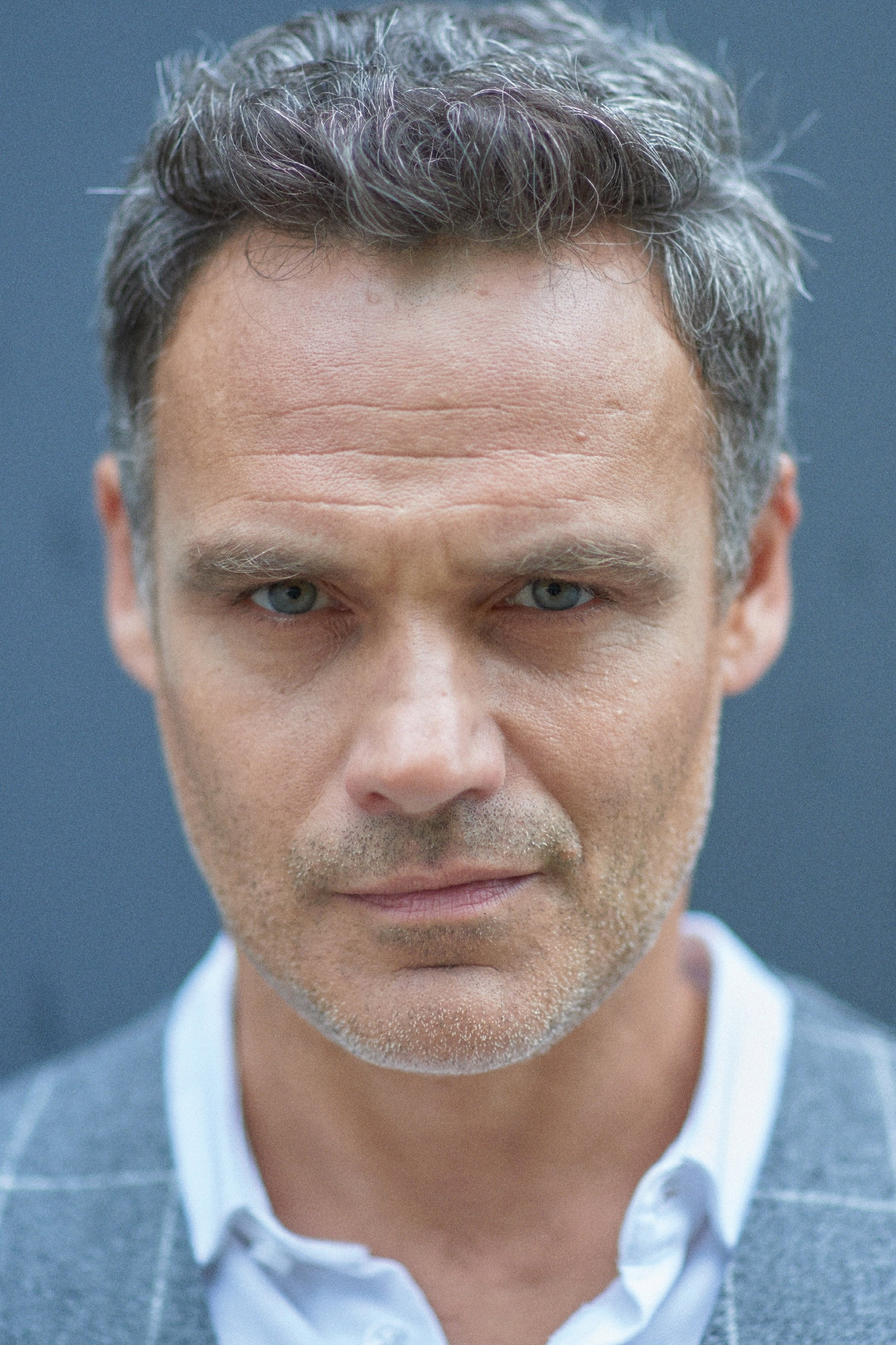 Jan Wieczorkowski as Ksiądz Radek Strumiłło in Determinator