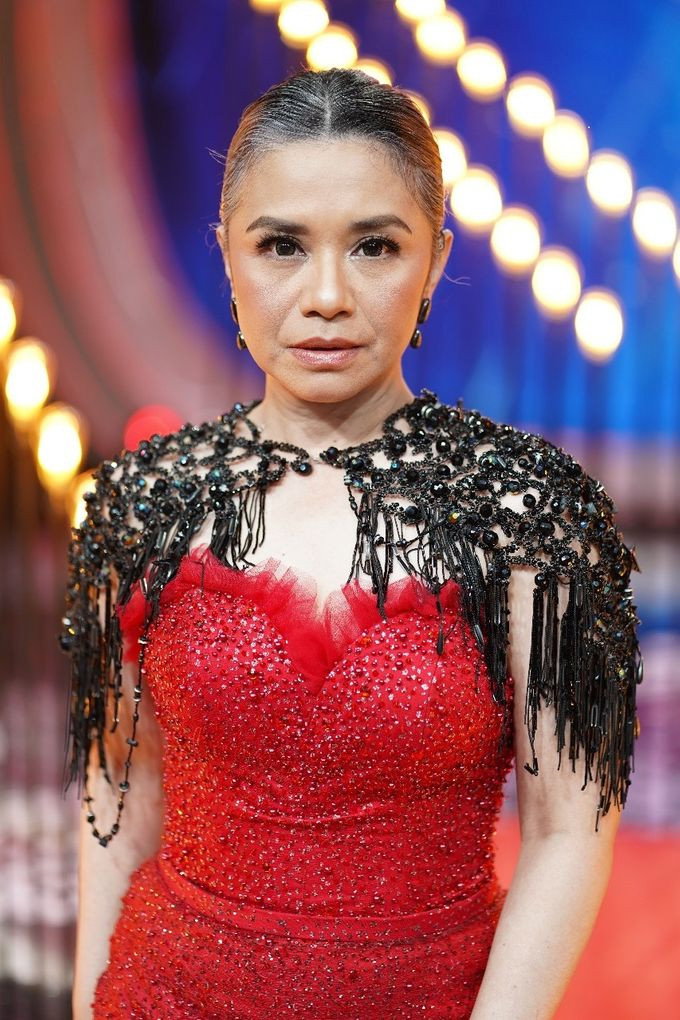 Ruth Sahanaya as Mama Linda (Glenn Fredly's Mother) in Glenn Fredly: The Movie