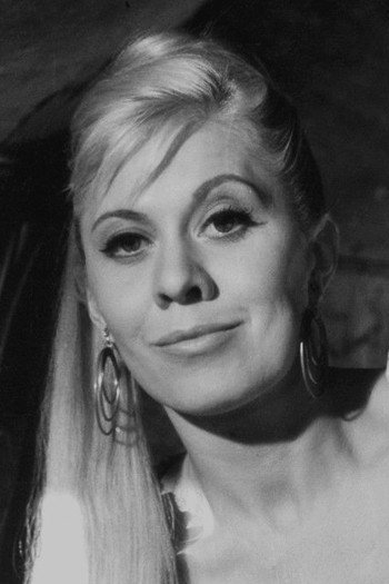 Inga Gill as Manager för Ola & Janglers in A Funny Thing Happened on the Way to Gothenburg