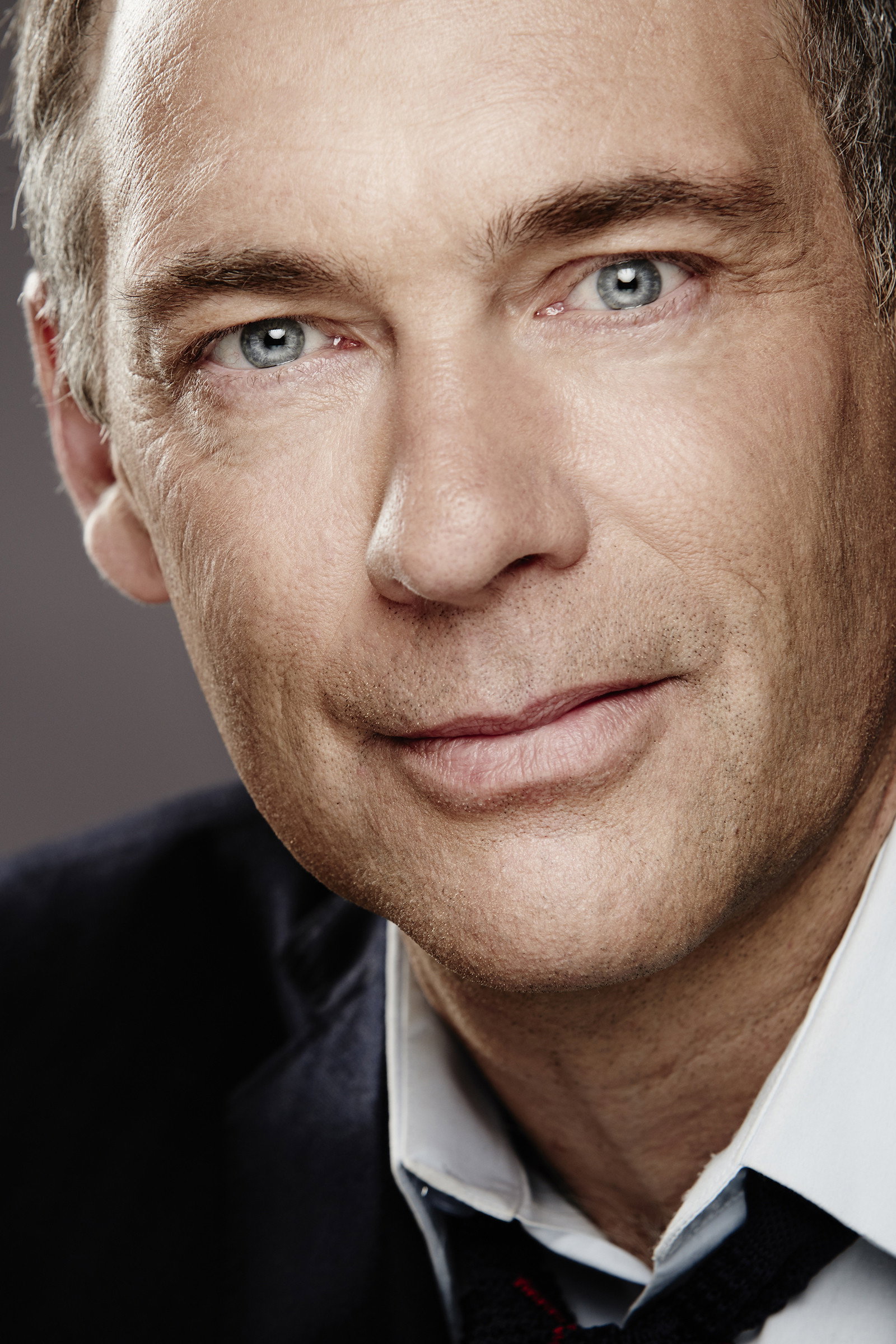 Pierre Gendron as Detective Lambert in The High Cost of Living