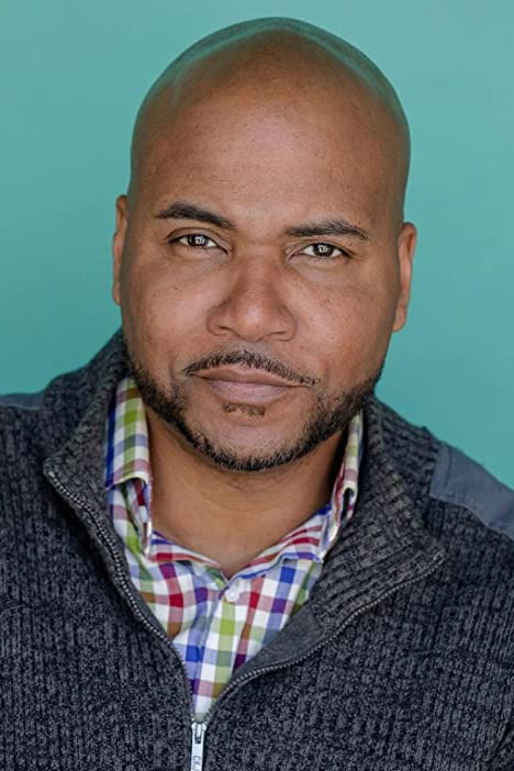 Vincent M. Ward as Dr. Roosevelt Jones in John Wynn's Mirror Mirror