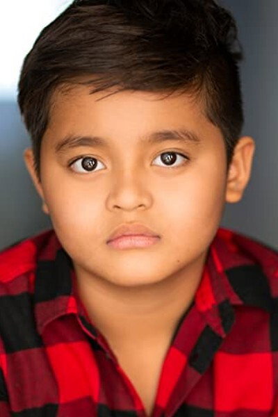 Calix Miguel as Charlie in A Godwink Christmas: Miracle of Love