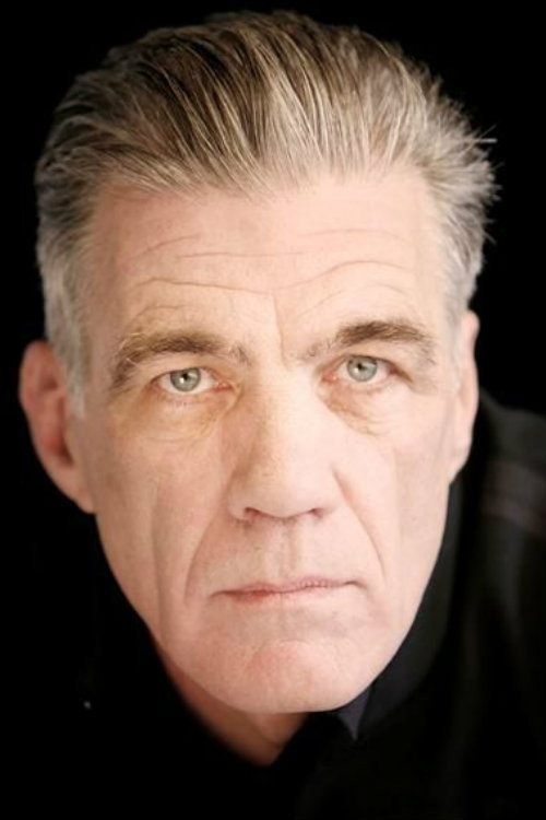 Garry Cooper as Stanley in In a Land of Plenty