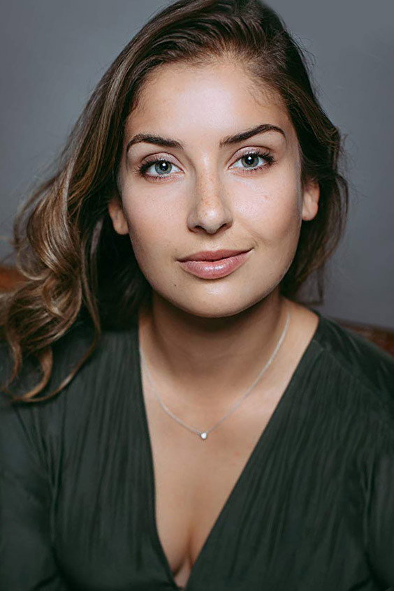 Tess Atkins as Becca in Just in Time for Christmas