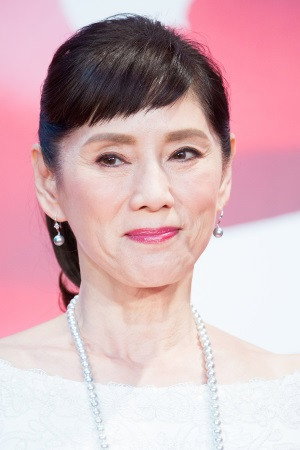 秋野暢子 as Satoko Hiyama in Stewardess Story