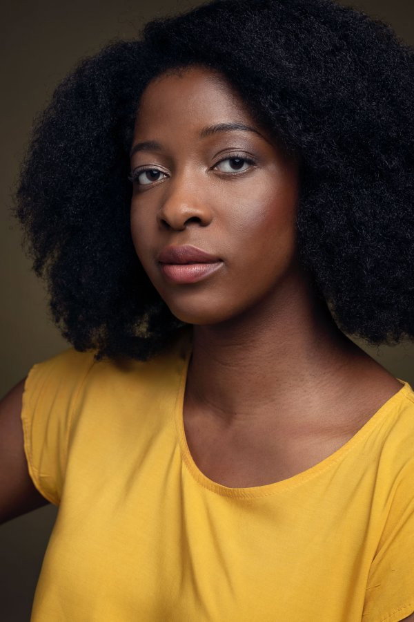 Céline Tshika as Pete/Mike's Wife in The Wapidemic