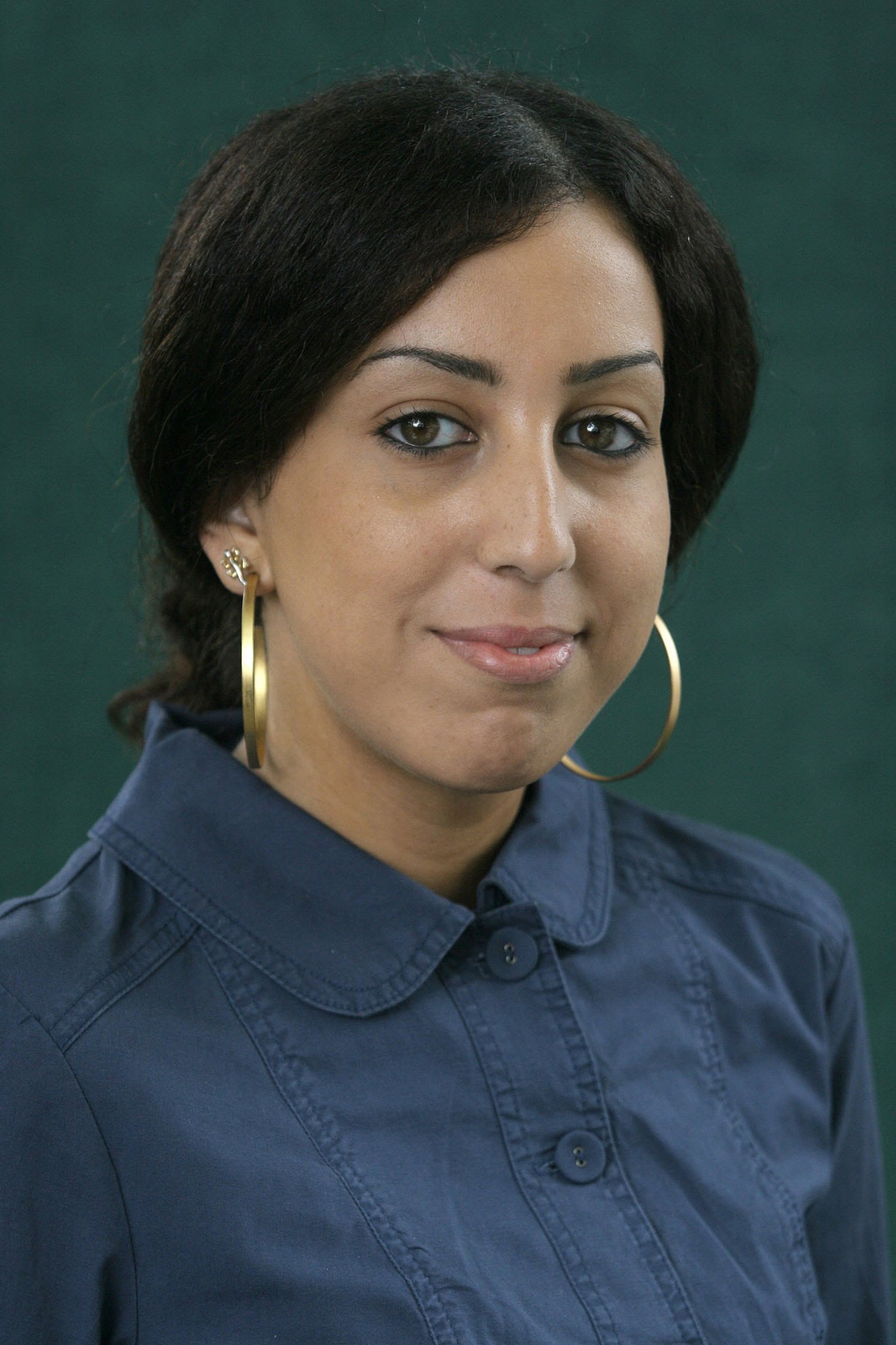 Faïza Guène as Soumaya in Sisters
