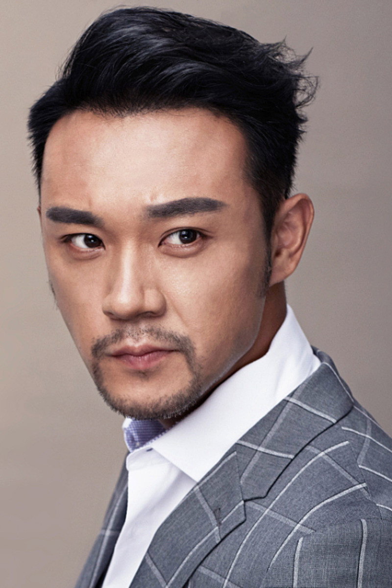 Wang Junpeng as 伍华 in Peking In Flames