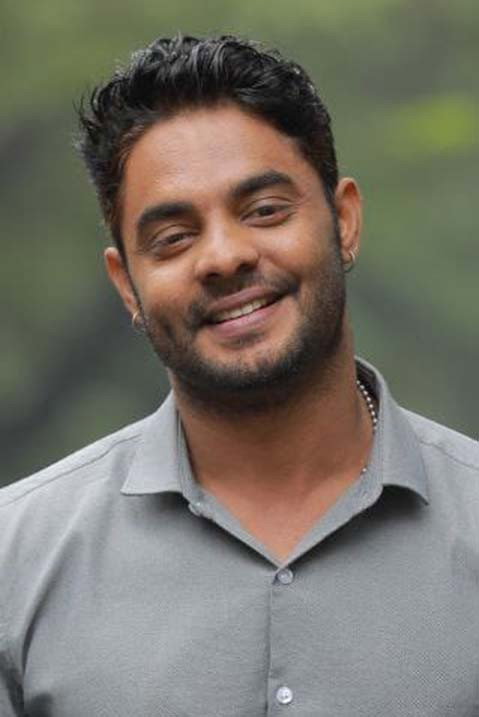 Dasarathi Narasimhan as Guru in Amigo Garage