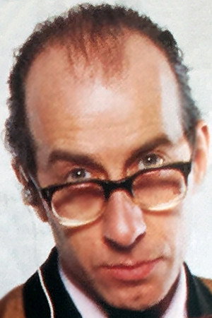 Simon Brint as Kenworth "Ken" Bishop in There's No Business...