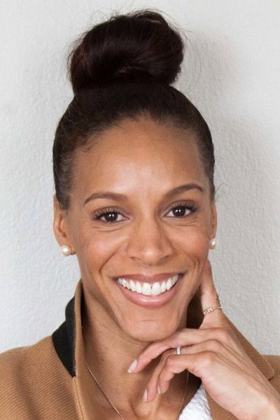 Sasha Spencer Atwood as Coach in Tracktown