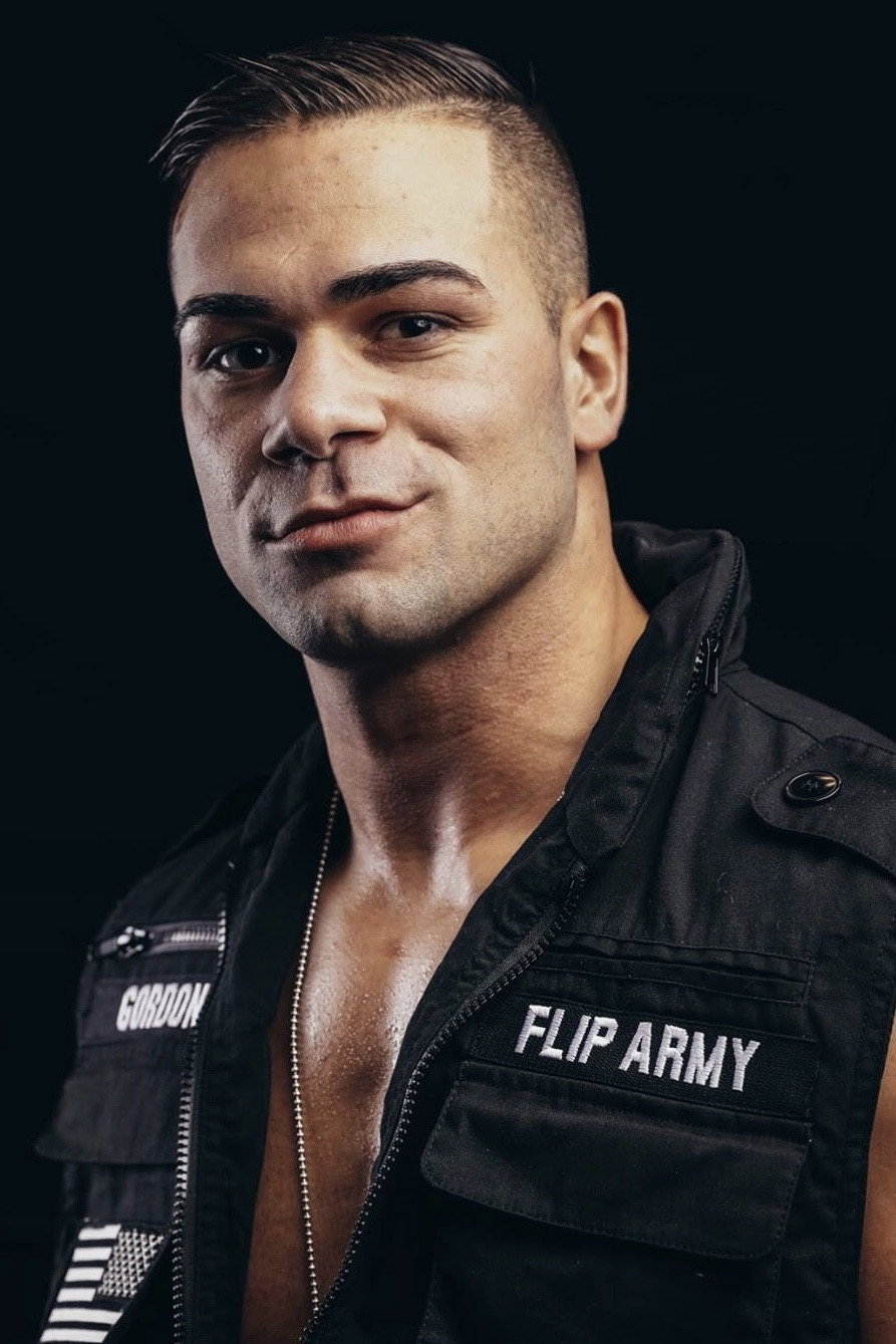 Travis Gordon as Lifeguard in Love Don’t Fade Away