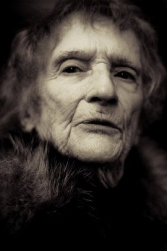 Renée Le Calm as Madame Renée in When the Cat's Away