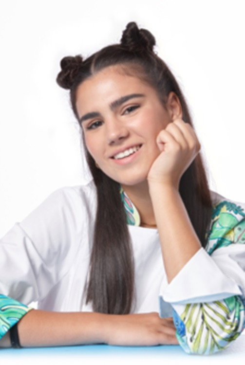 Paula Alós as Self - Host in Manduka Duo