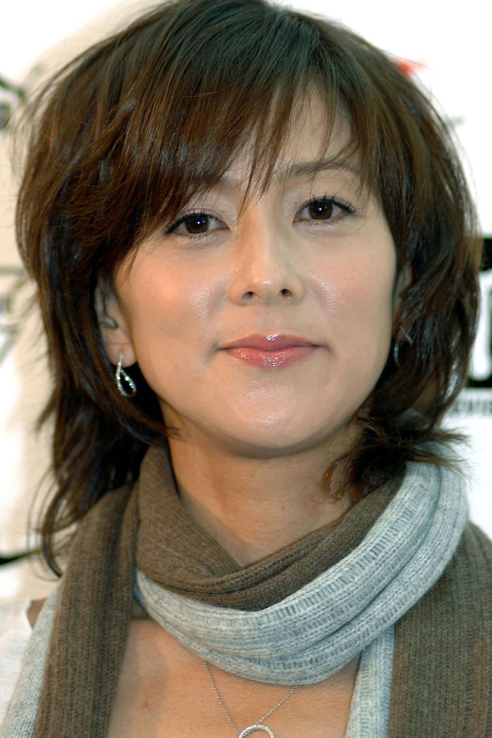 Risako Miura as Satoru's girlfriend in Inamura Jane