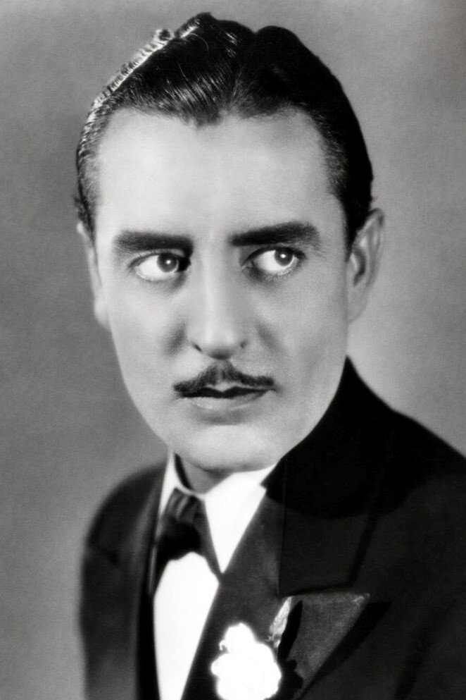 John Gilbert as Carlos Brent in Romance Ranch