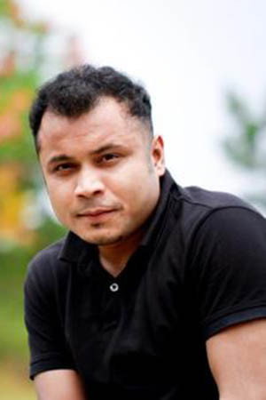 Mishu Sabbir as Akmol in Biporite Ami...