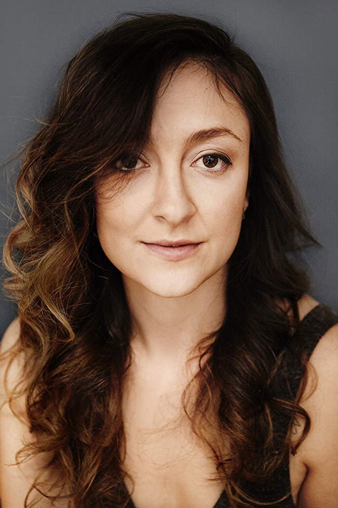 Elizabeth Alan as Ms. Selena in The Imbalancing Act