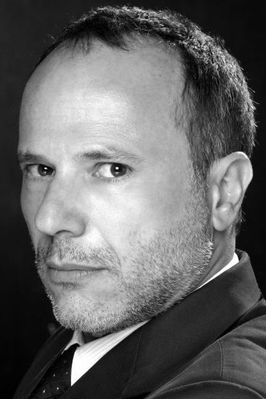 Alessandro Fabrizi as Rodolfo in The Burnt Orange Heresy