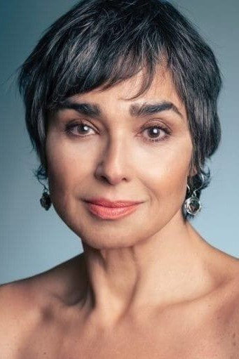 María Isabel Díaz Lago as Janice in Holy Camp!